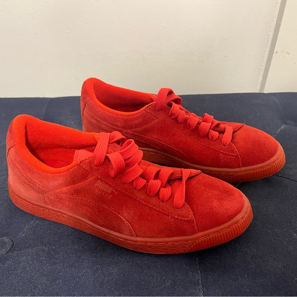Red suede puma sneakers